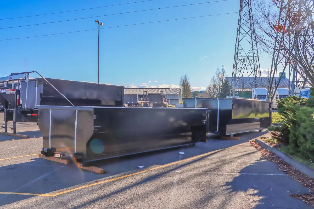 Roll-off dumpster ready for waste disposal at job site for 2 Yard Dumpster Rental in White Marsh